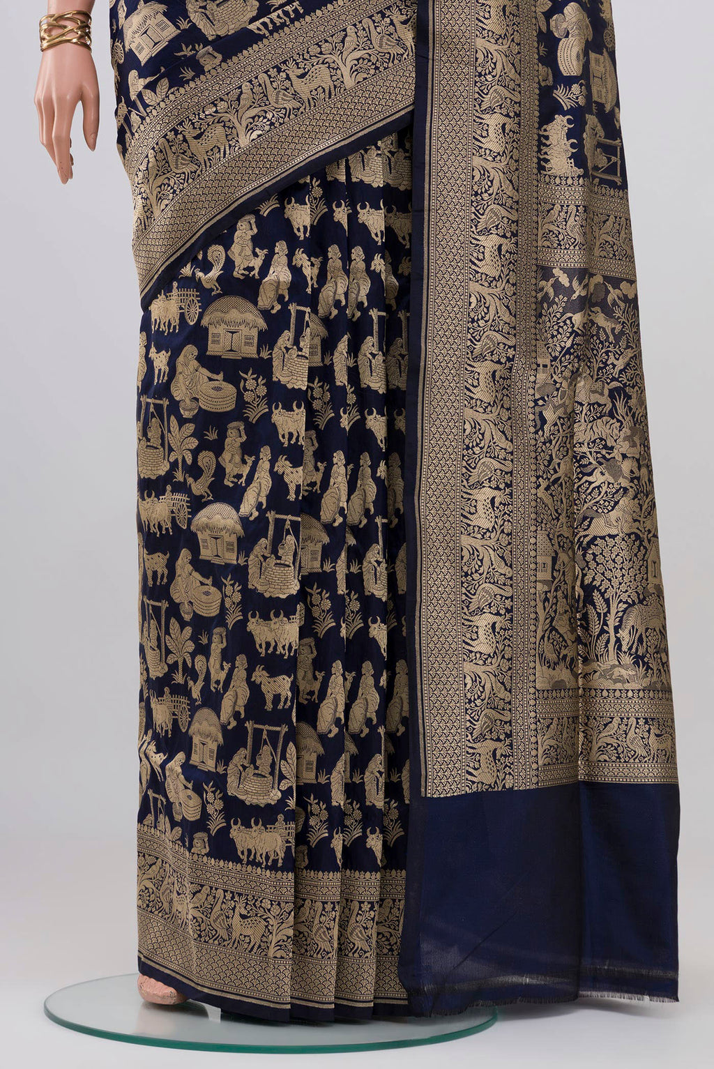 Pleats and pallu of Navy Blue Banarasi Saree with Zari Brocade on the body and Fancy Border. 