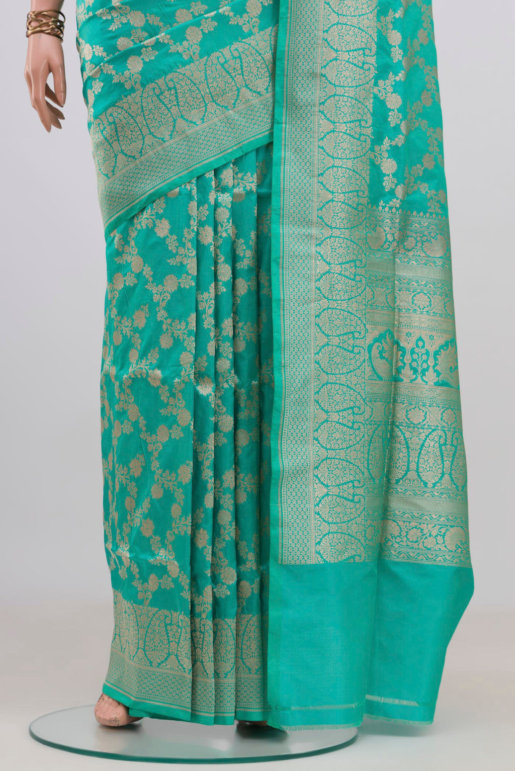 Pleats and pallu of Pure Silk Turquoise Banarasi Saree with Zari Brocade on the body and Zari Border. 