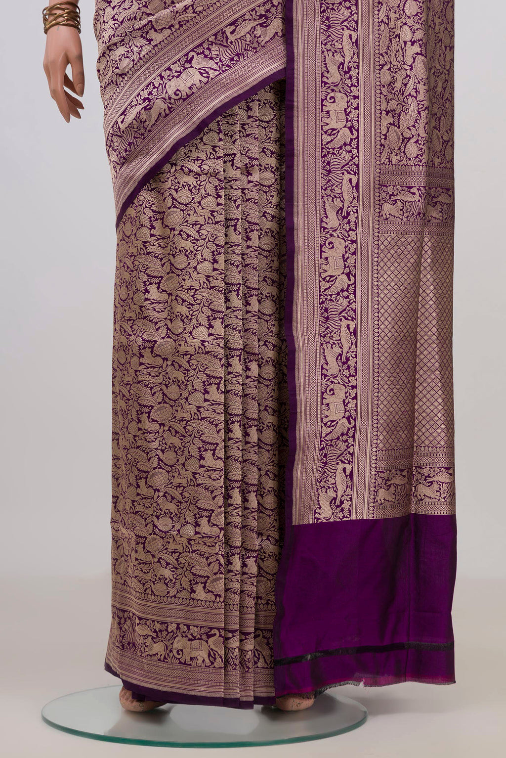 Pleats and pallu of Pure Silk Purple Banarasi Saree with Zari Brocade on the body and Zari Border. 