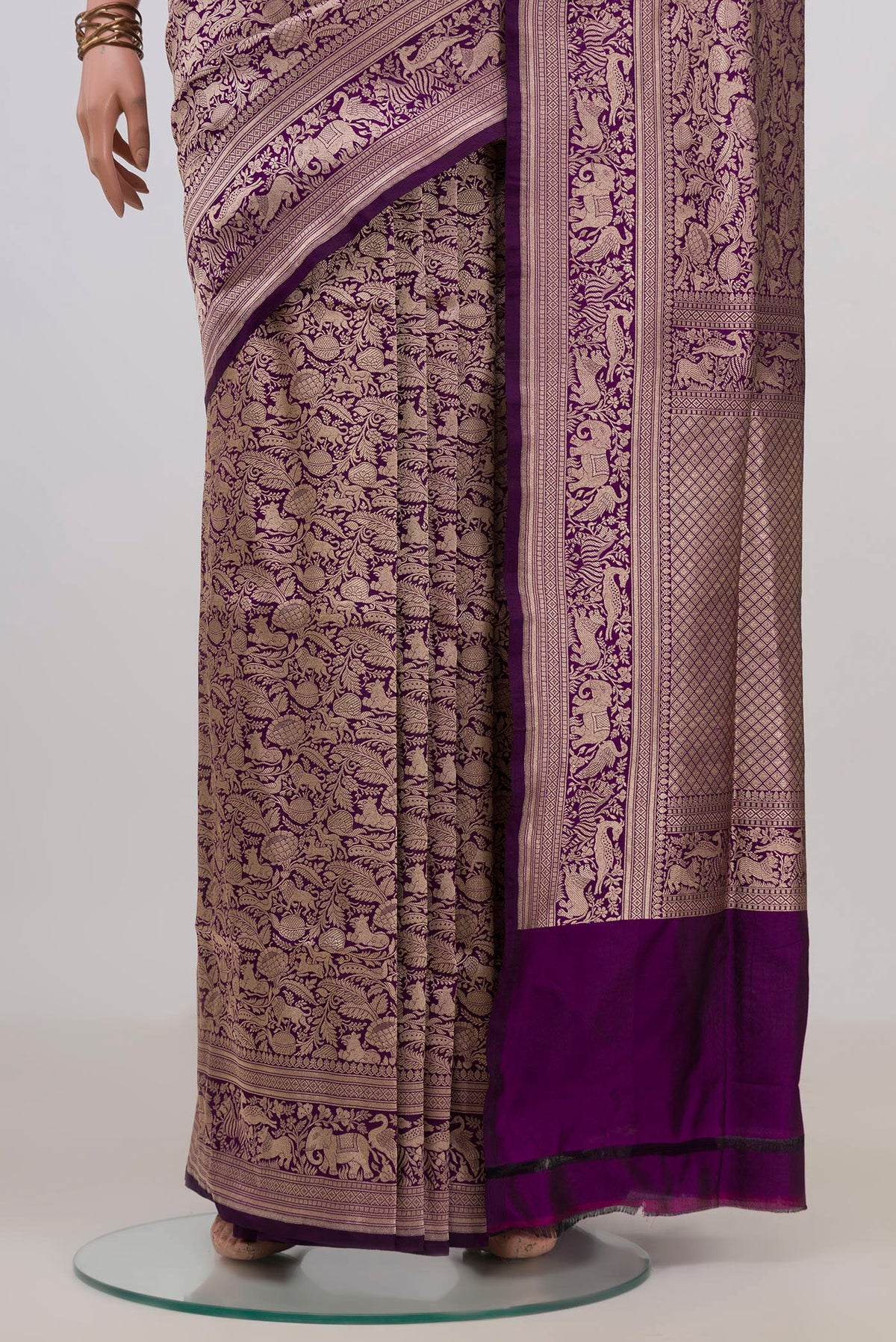 Pleats and pallu of Pure Silk Purple Banarasi Saree with Zari Brocade on the body and Zari Border. 