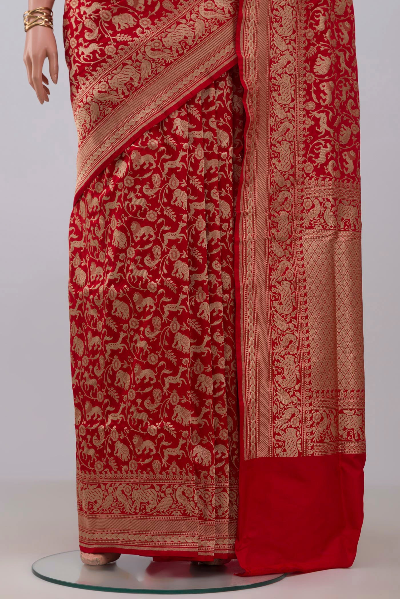 Pleats and pallu of Red Banarasi Silk Saree with Zari Brocade on the body and Zari Border. 