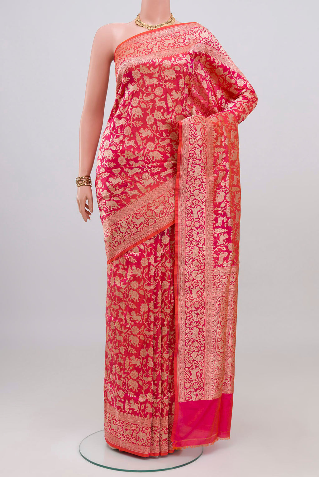 Pink with Orange Color Banarasi Silk Saree with Zari Brocade on the body and Fancy Border.  displayed on a mannequin