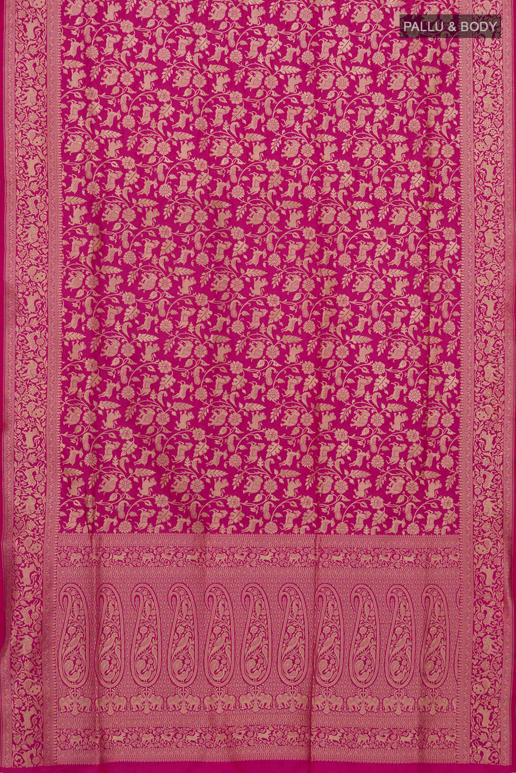 Flat view of Rani Pink Banarasi Silk Saree with Zari Brocade on the body and Zari Border. 