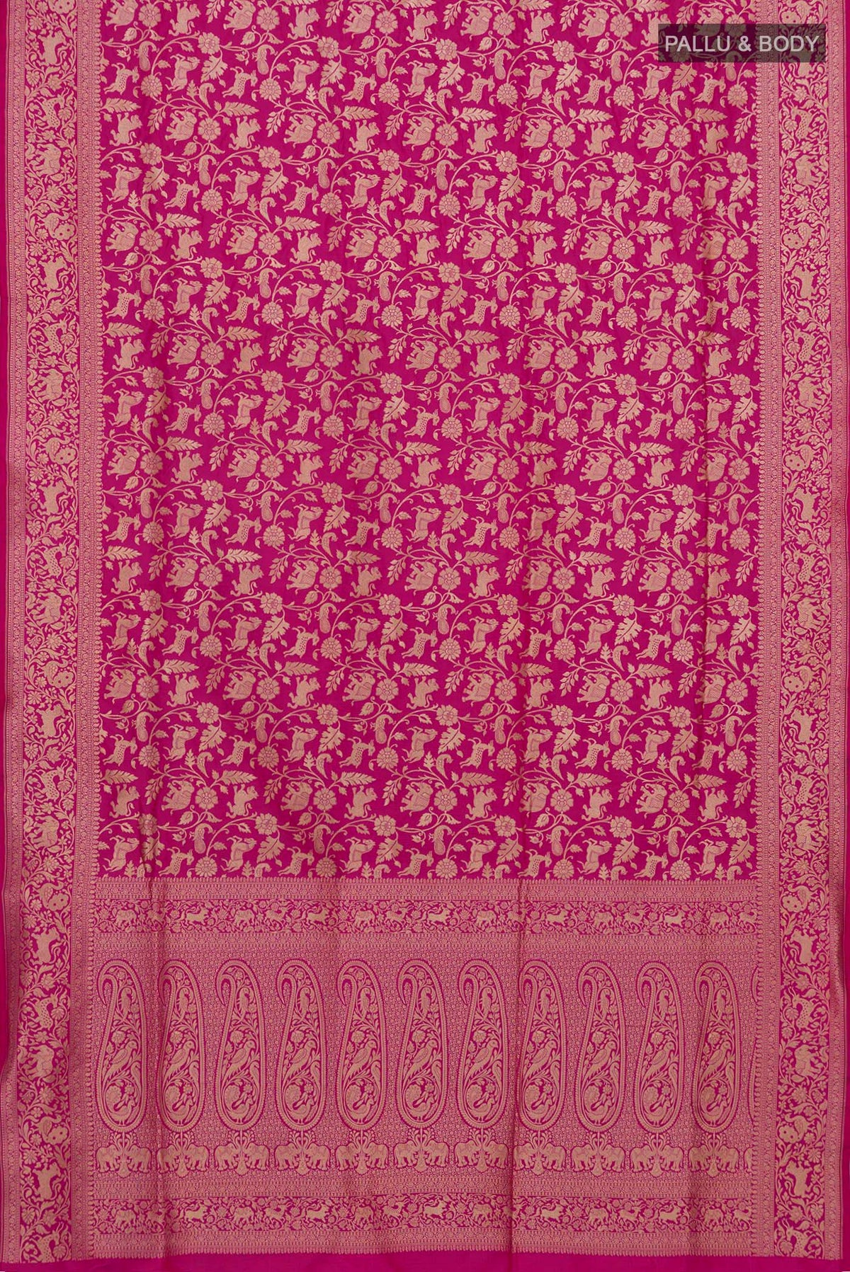 Flat view of Rani Pink Banarasi Silk Saree with Zari Brocade on the body and Zari Border. 