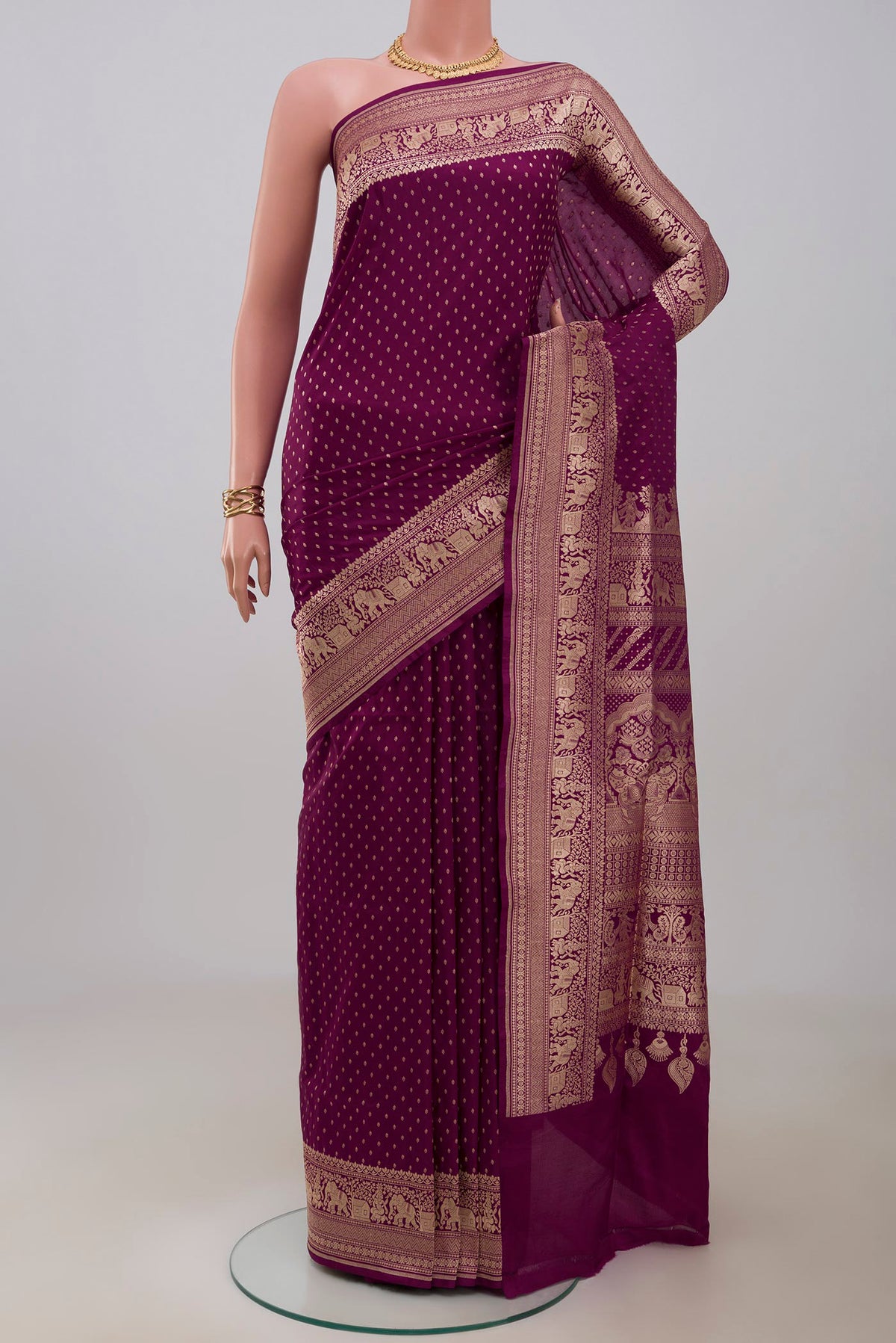 Purple Banarasi Silk Saree with Zari Butta on the body and Zari Border.  displayed on a mannequin