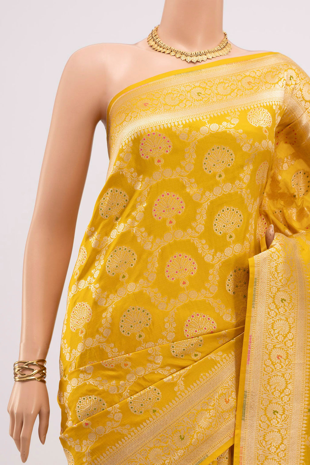Border image of Yellow Banarasi Saree with Zari Brocade on the body and Fancy Border. 