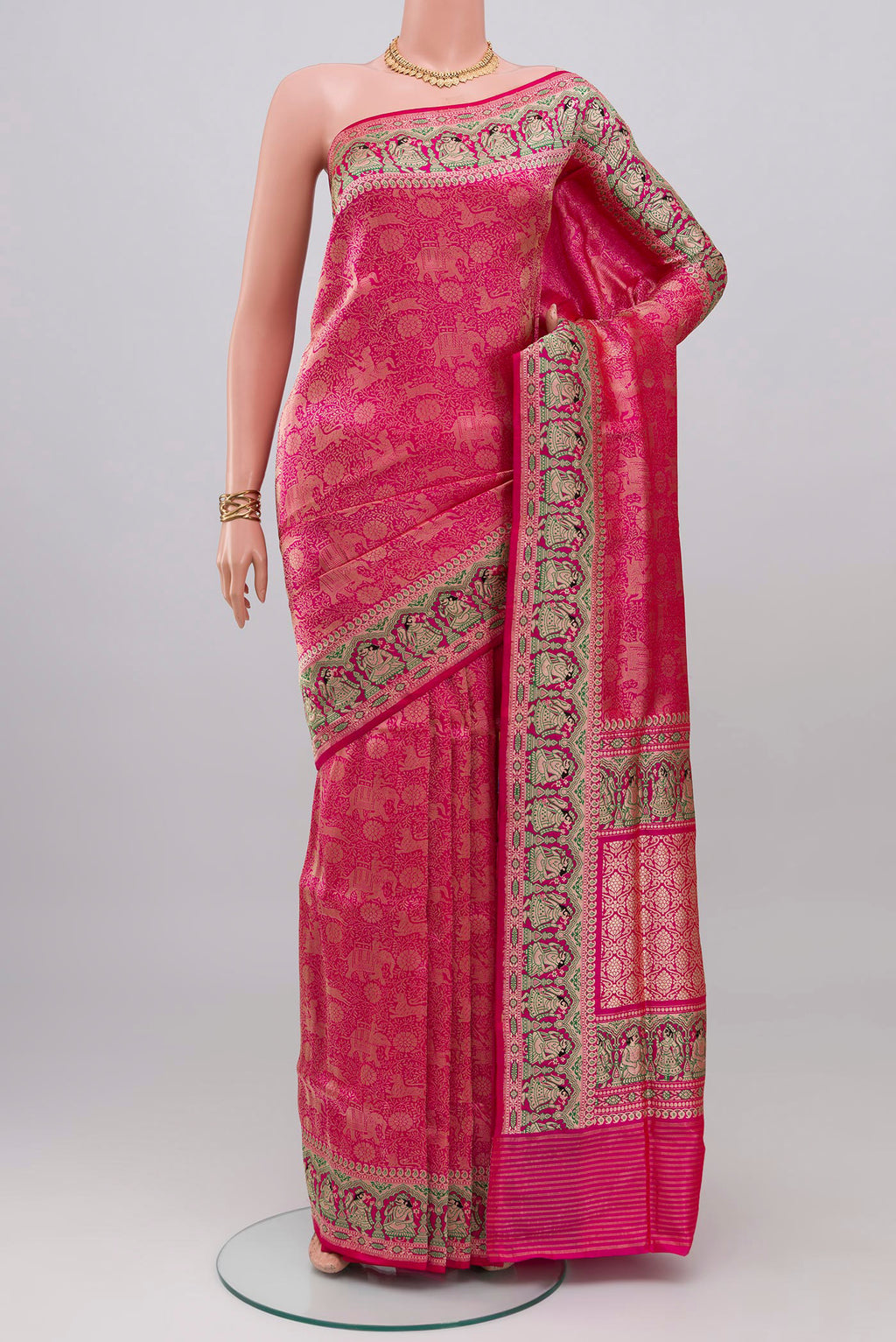 Pink Banarasi Silk Saree with Zari Brocade on the body and Fancy Border.  displayed on a mannequin
