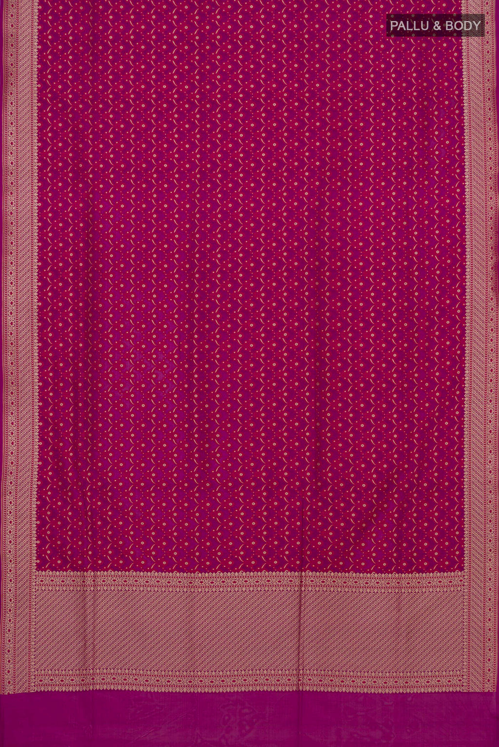 Flat view of Pure Silk Magenta Banarasi Saree with Zari And Thread Butta on the body and Zari Border. 