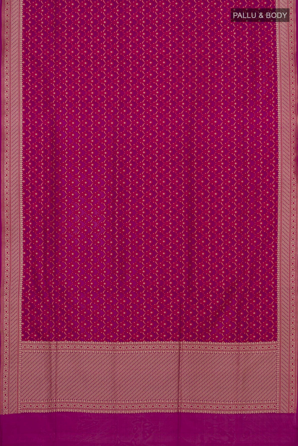 Flat view of Pure Silk Magenta Banarasi Saree with Zari And Thread Butta on the body and Zari Border. 