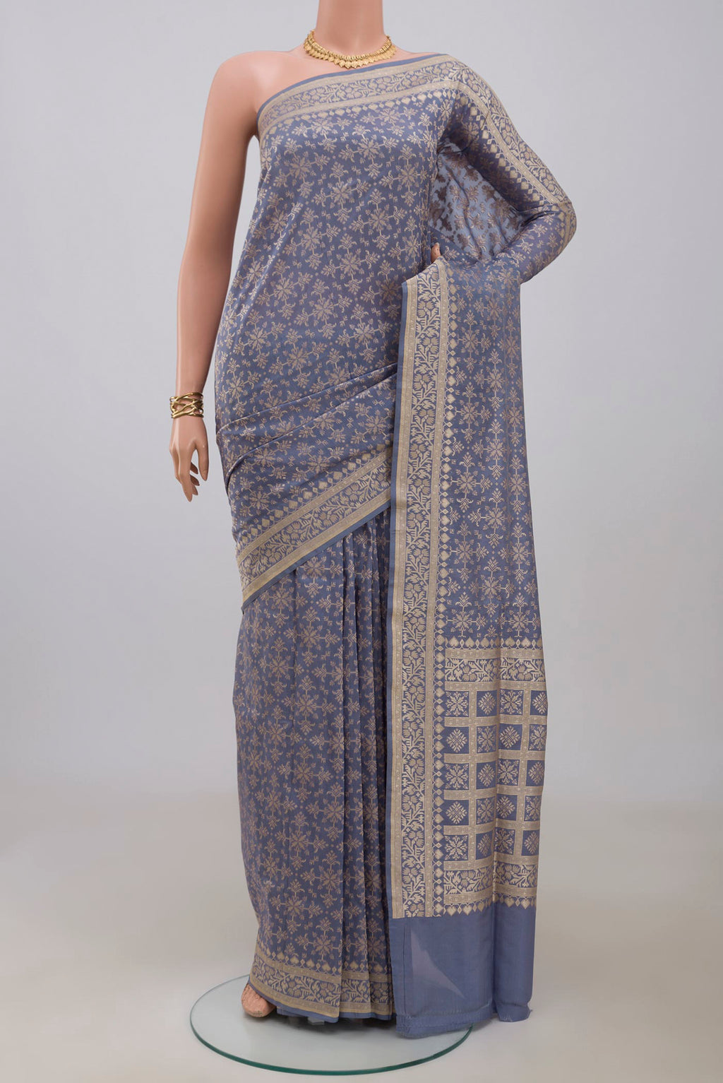 Blue Grey Banarasi Saree with Fancy on the body and Fancy Border.  displayed on a mannequin