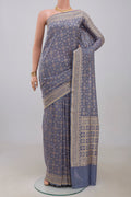 Blue Grey Banarasi Saree with Fancy on the body and Fancy Border.  displayed on a mannequin