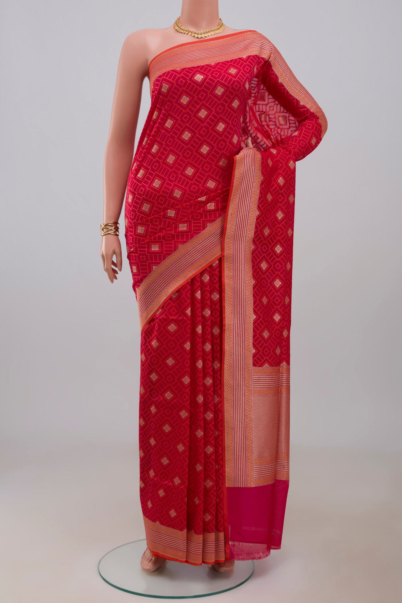 Pink Banarasi Saree with Jacquard With Zari Butta on the body and Fancy Border.  displayed on a mannequin