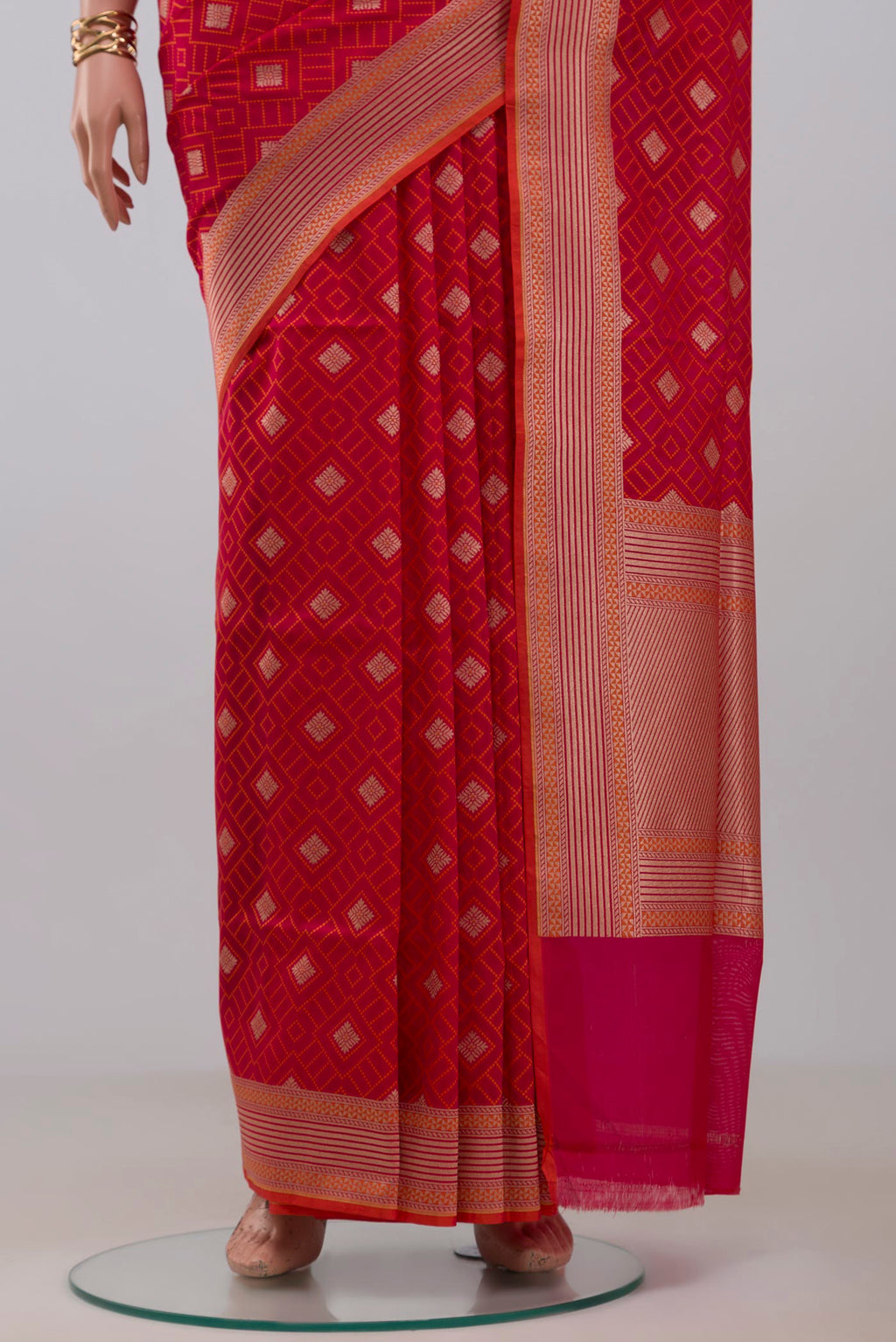 Pleats and pallu of Pink Banarasi Saree with Jacquard With Zari Butta on the body and Fancy Border. 