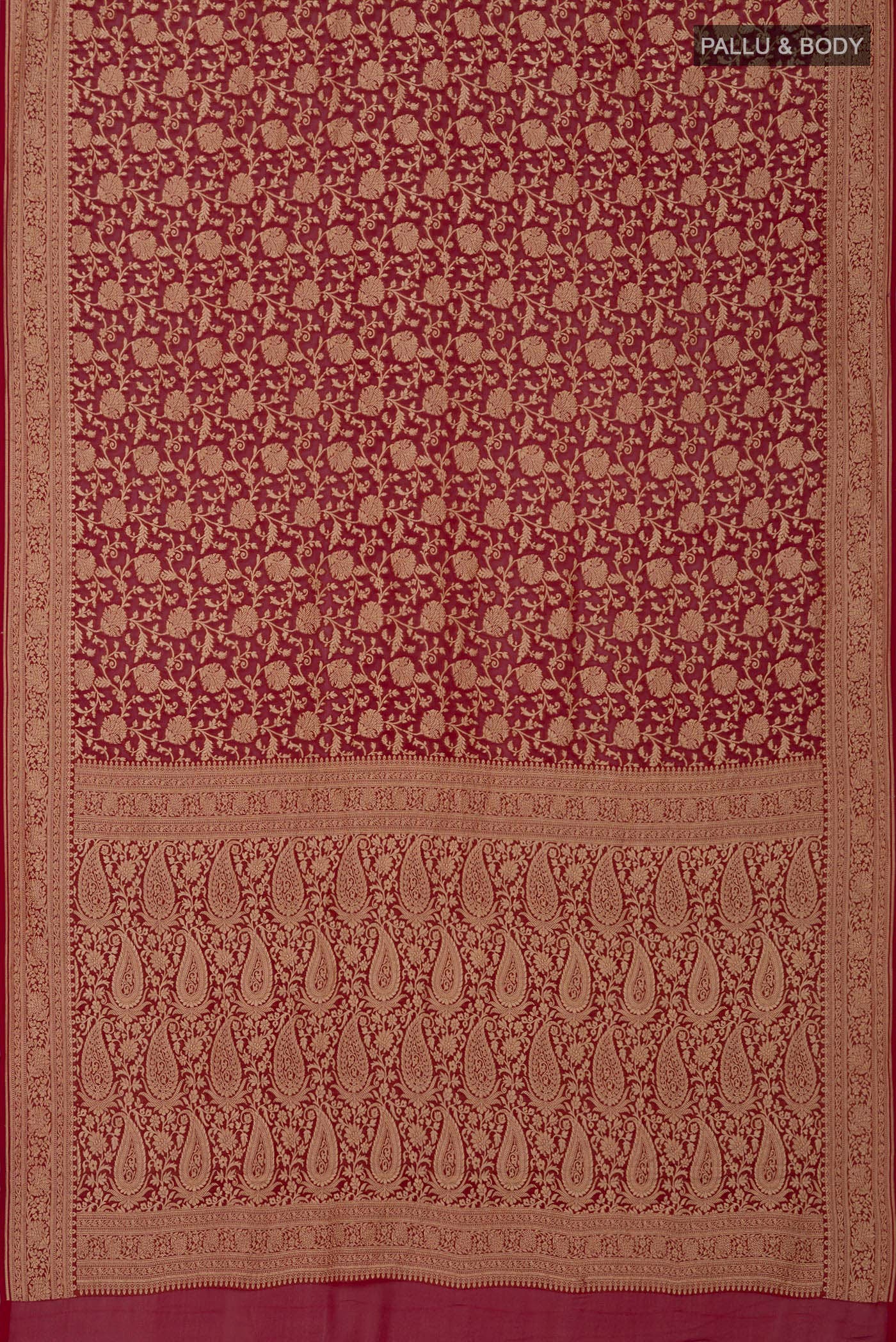Flat view of Red Georgette Saree with Fancy on the body and Zari Border. 