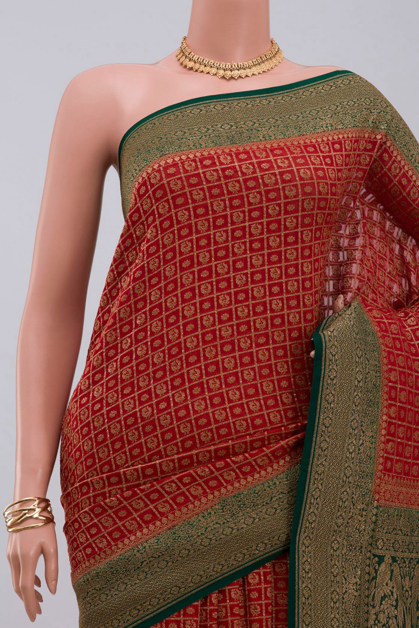 Border image of Maroon Georgette Saree with Fancy on the body and Zari Border. 