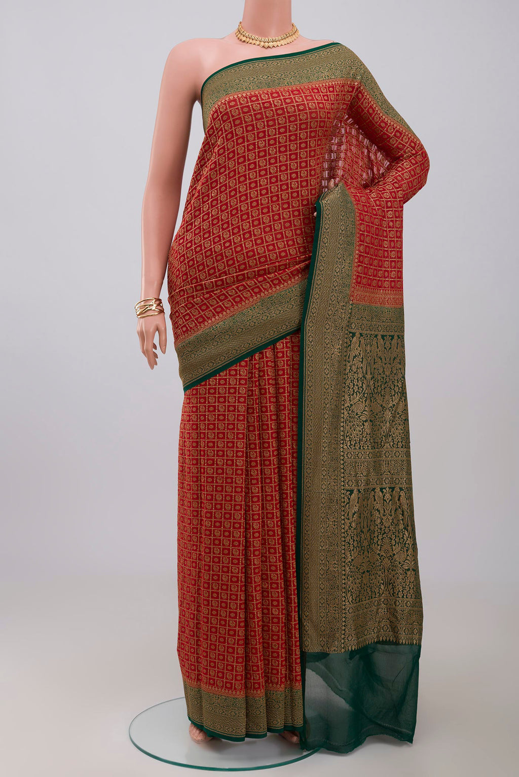 Maroon Georgette Saree with Fancy on the body and Zari Border.  displayed on a mannequin