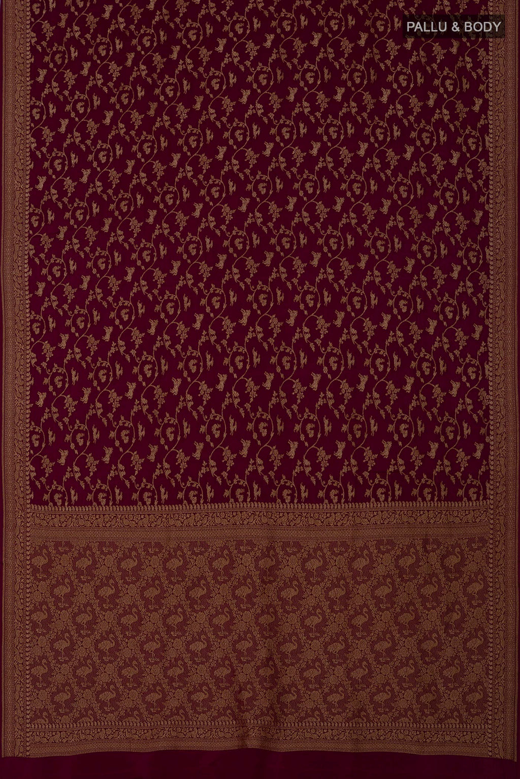 Flat view of Brown Georgette Saree with Fancy on the body and Zari Border. 