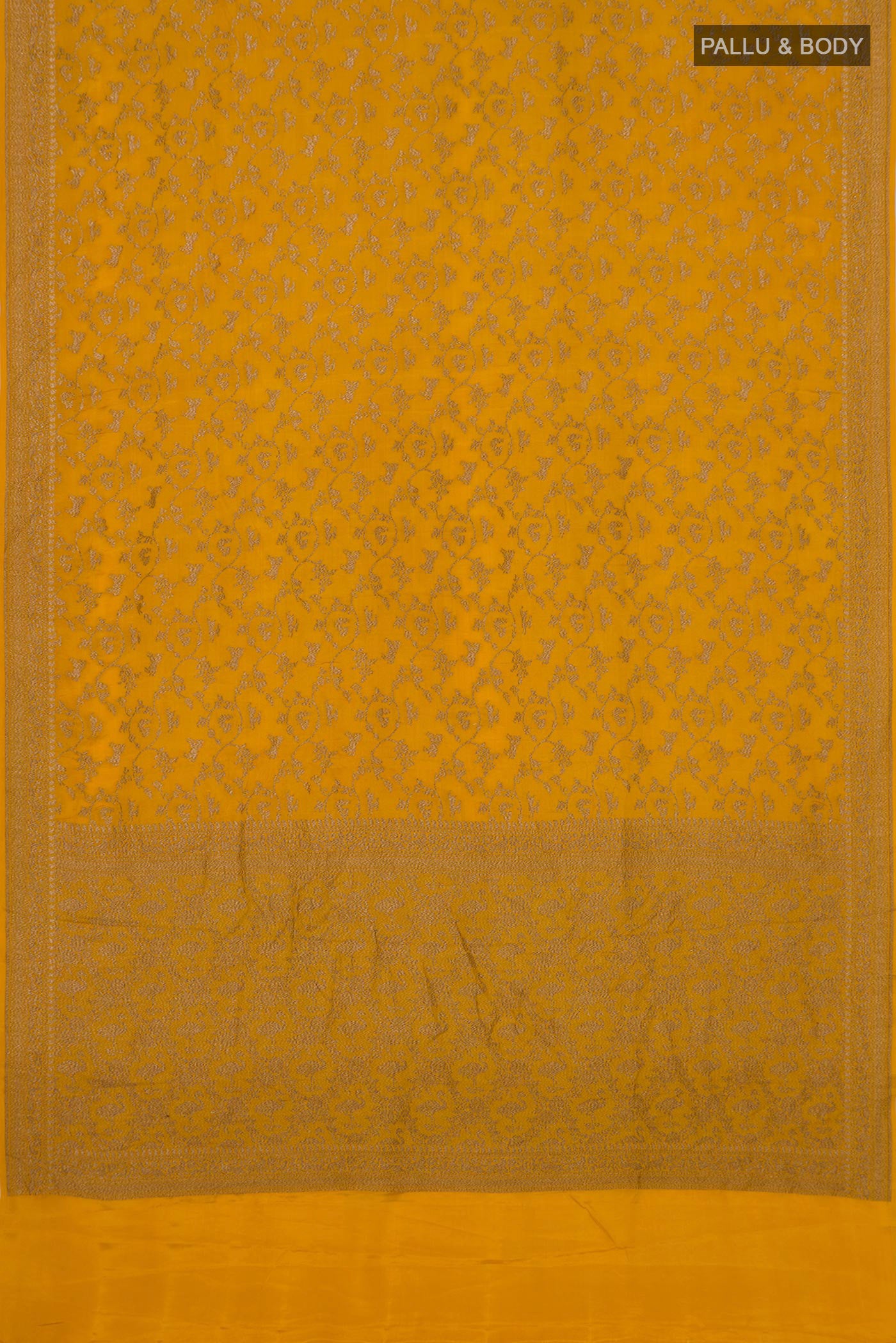 Flat view of Yellow Banarasi Georgette Saree with Zari Butta on the body and Zari Border. 