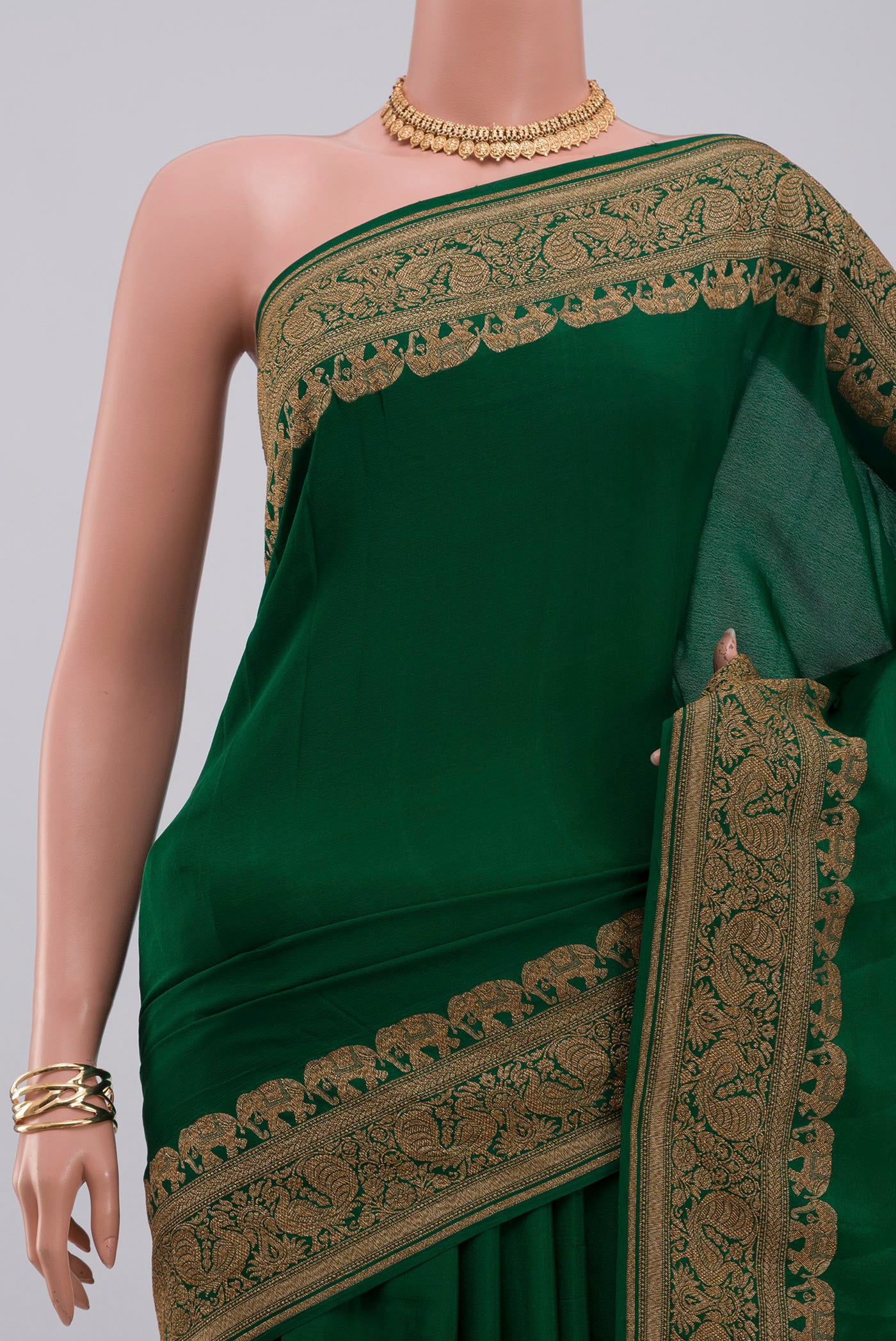 Border image of Green Georgette Saree with Plain Body and Zari Border. 