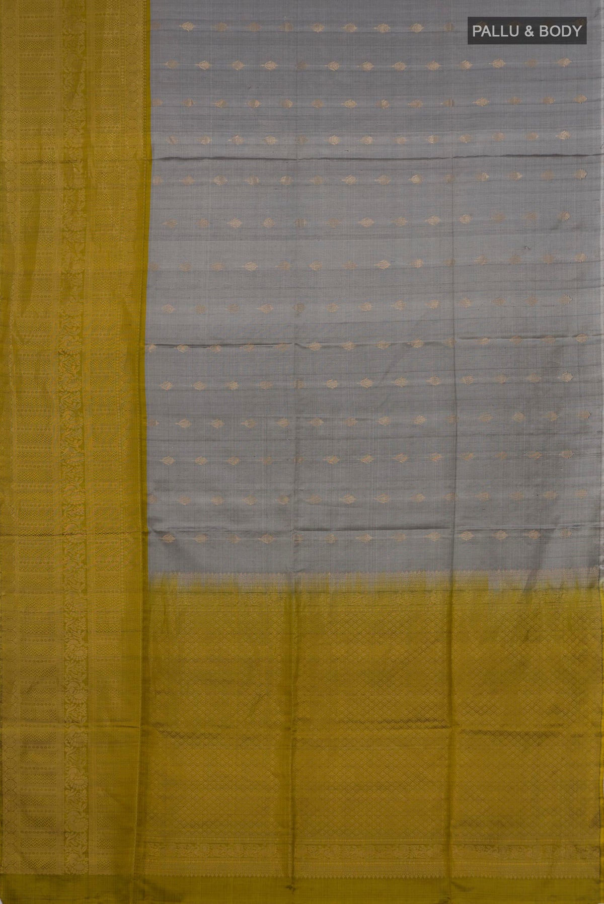 Flat view of Pure Silk Grey Soft Saree with Zari Butta on the body and Fancy Border. 