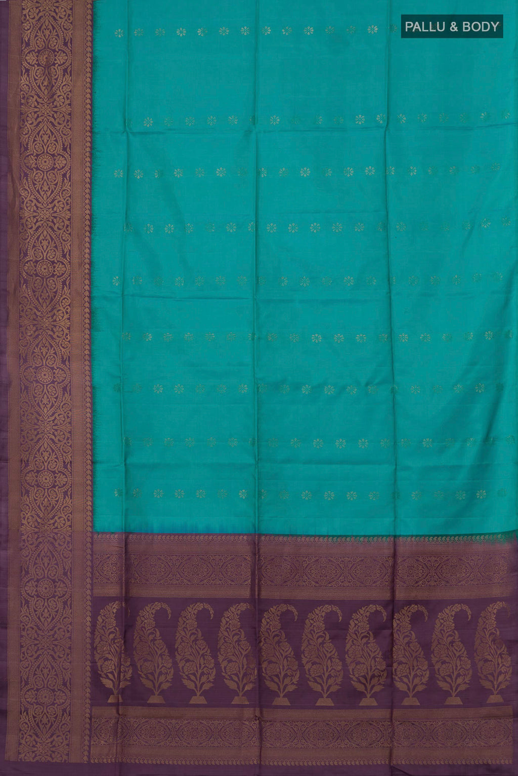 Flat view of Peacock Blue Soft Silk Saree with Zari Butta on the body and Fancy Border. 