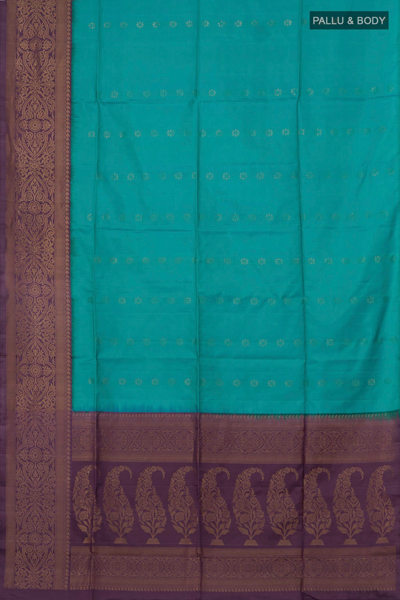 Flat view of Peacock Blue Soft Silk Saree with Zari Butta on the body and Fancy Border. 