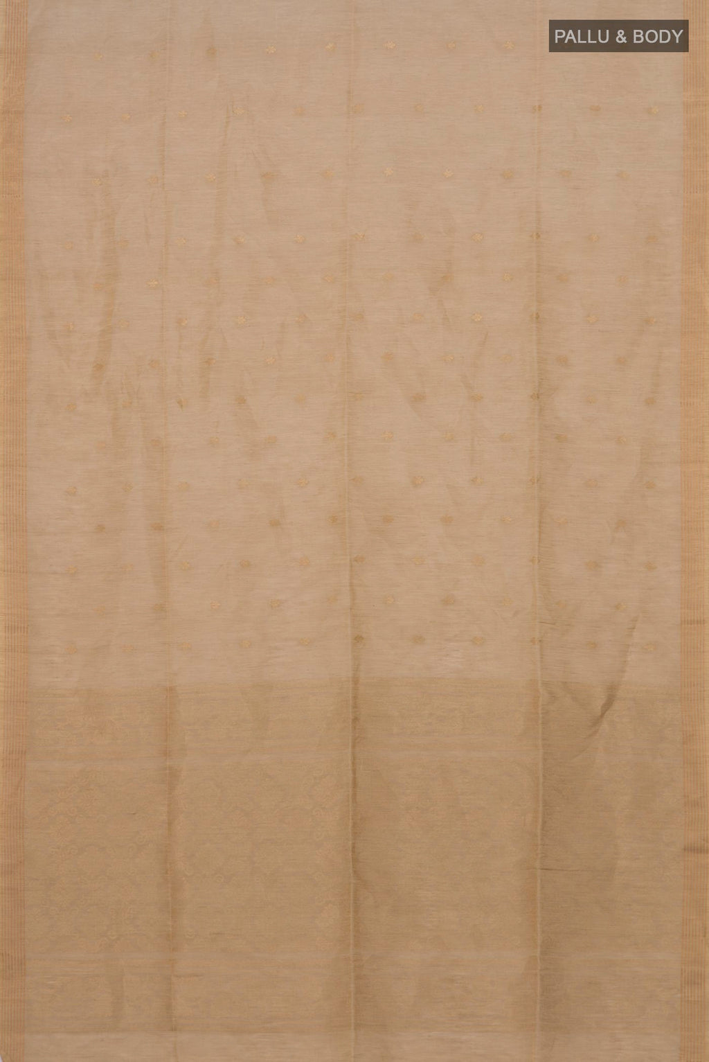 Flat view of Beige Soft Silk Saree with Zari Butta on the body and Thin Zari Line. 