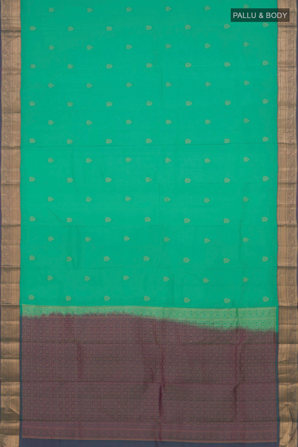 Flat view of Pure Silk Green Soft Saree with Zari Butta on the body and Zari Border. 