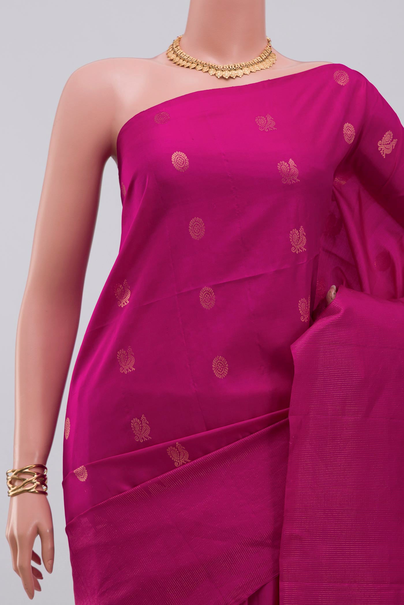 Border image of Magenta Soft Silk Saree with Zari Butta on the body and Fancy Border. 