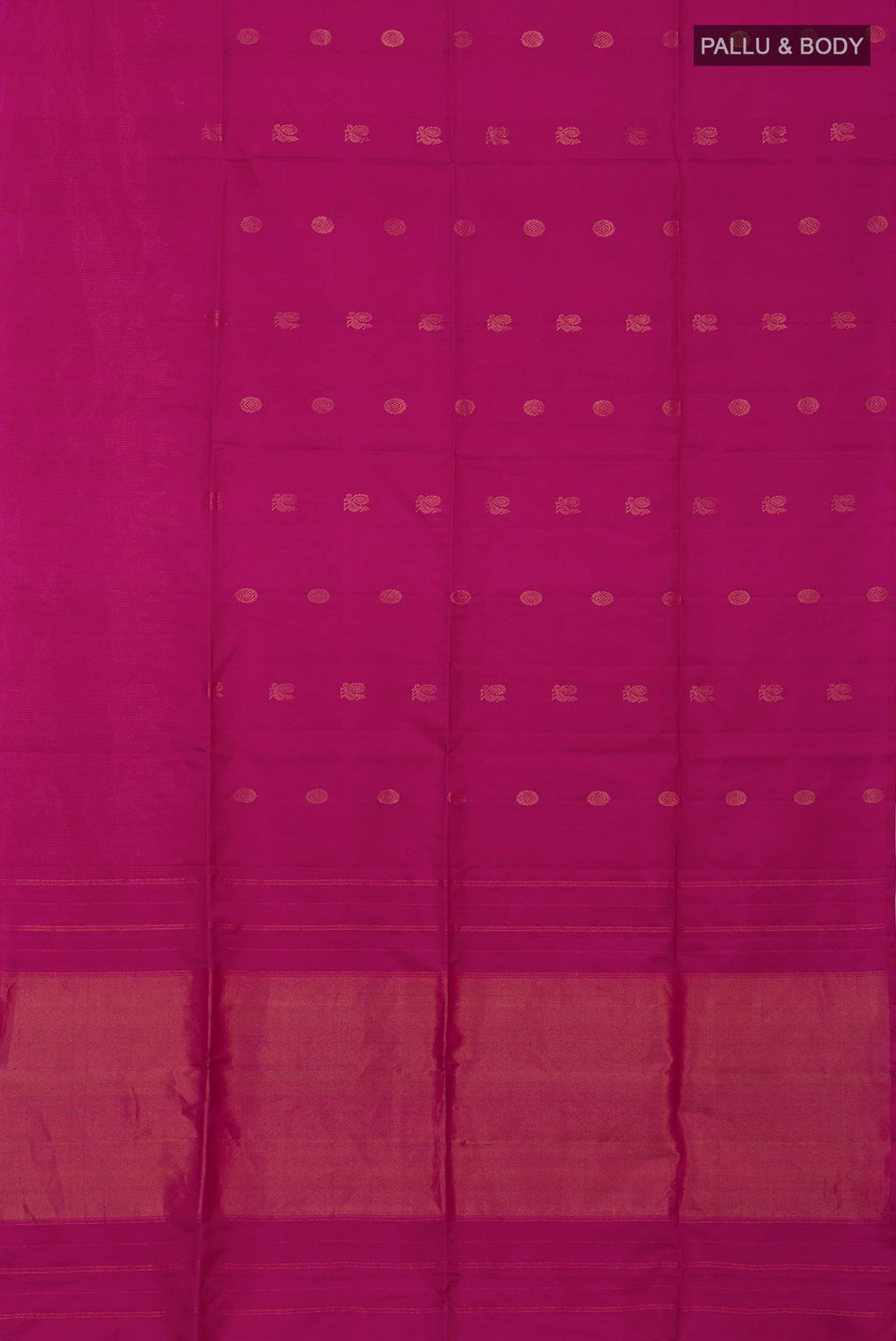 Flat view of Magenta Soft Silk Saree with Zari Butta on the body and Fancy Border. 