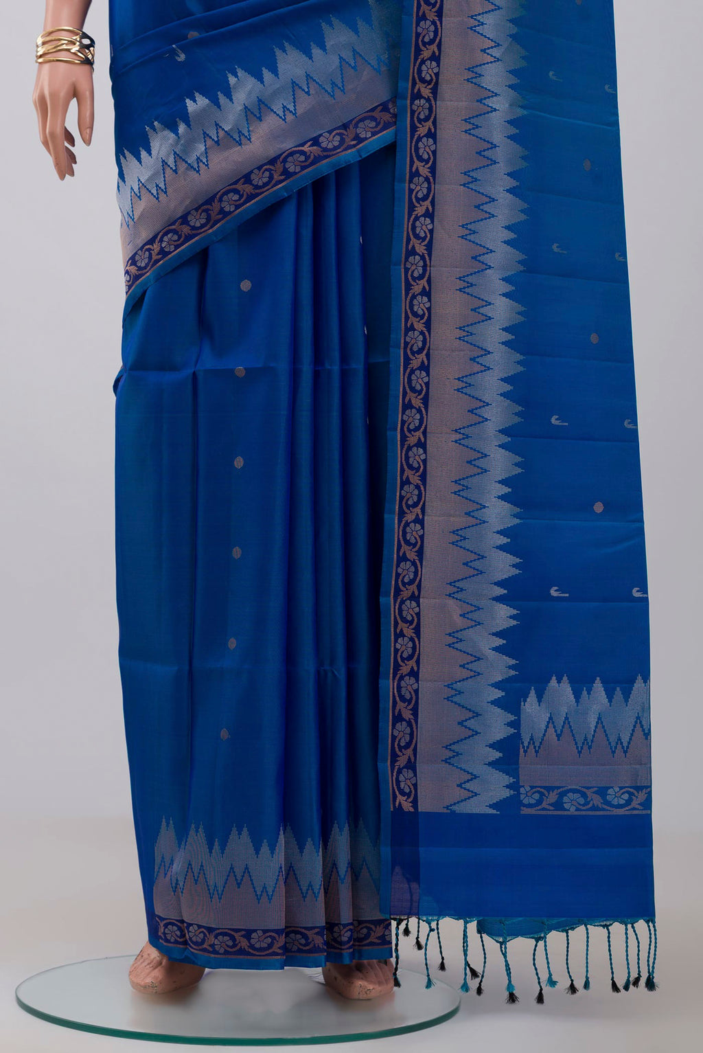 Pleats and pallu of Blue Soft Silk Saree with Zari Butta on the body and Fancy Border. 