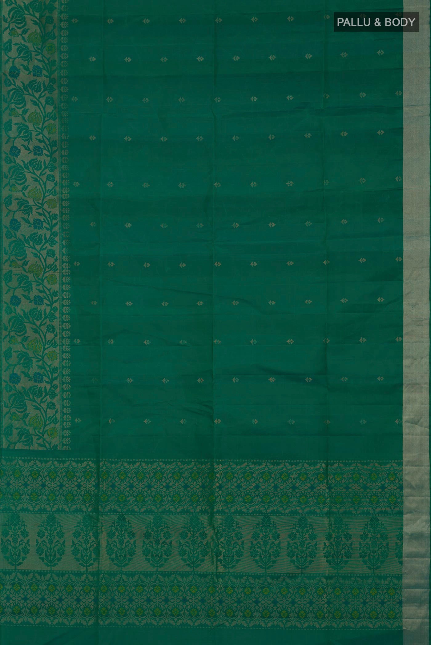 Flat view of Green Soft Silk Saree with Zari Butta on the body and Zari Border. 