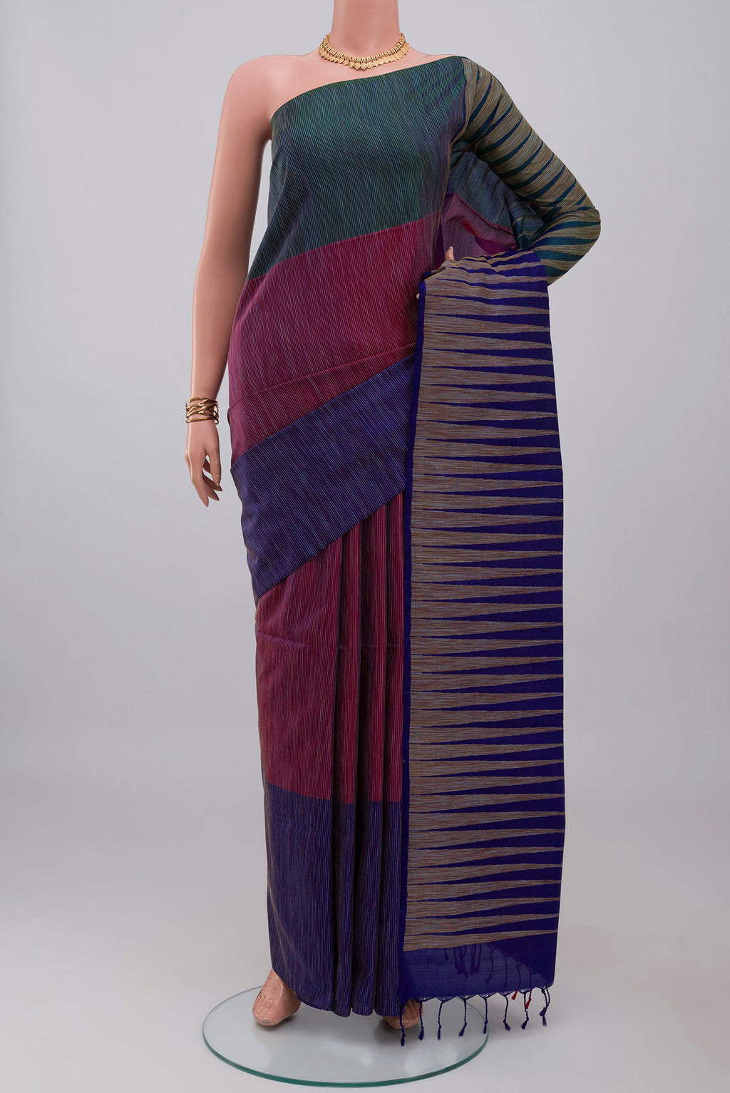 Multi Color Soft Silk Saree with Fancy on the body and Without Border.  displayed on a mannequin