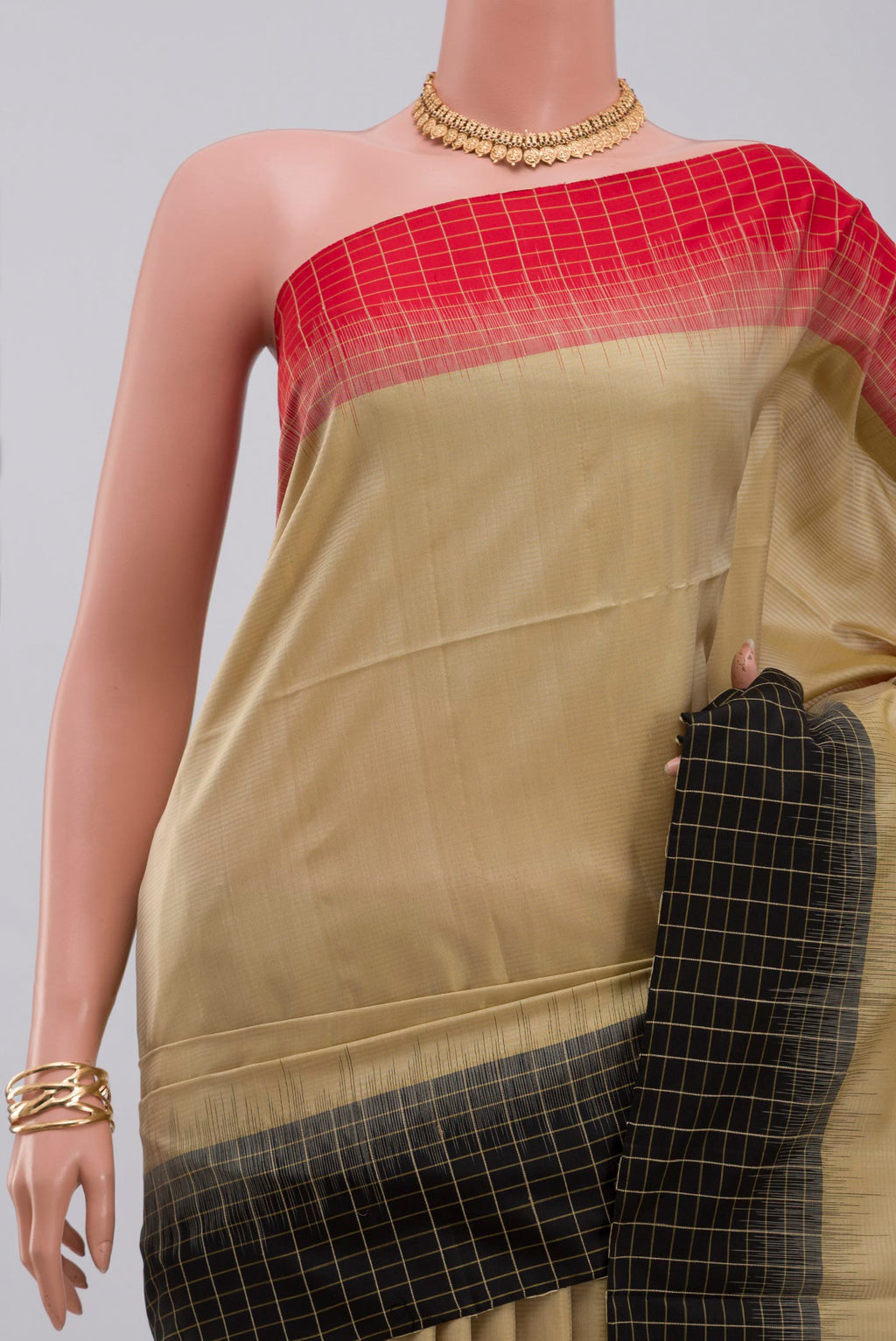 Border image of Cream Soft Silk Saree with Plain Body and Ganga Jamuna Border. 