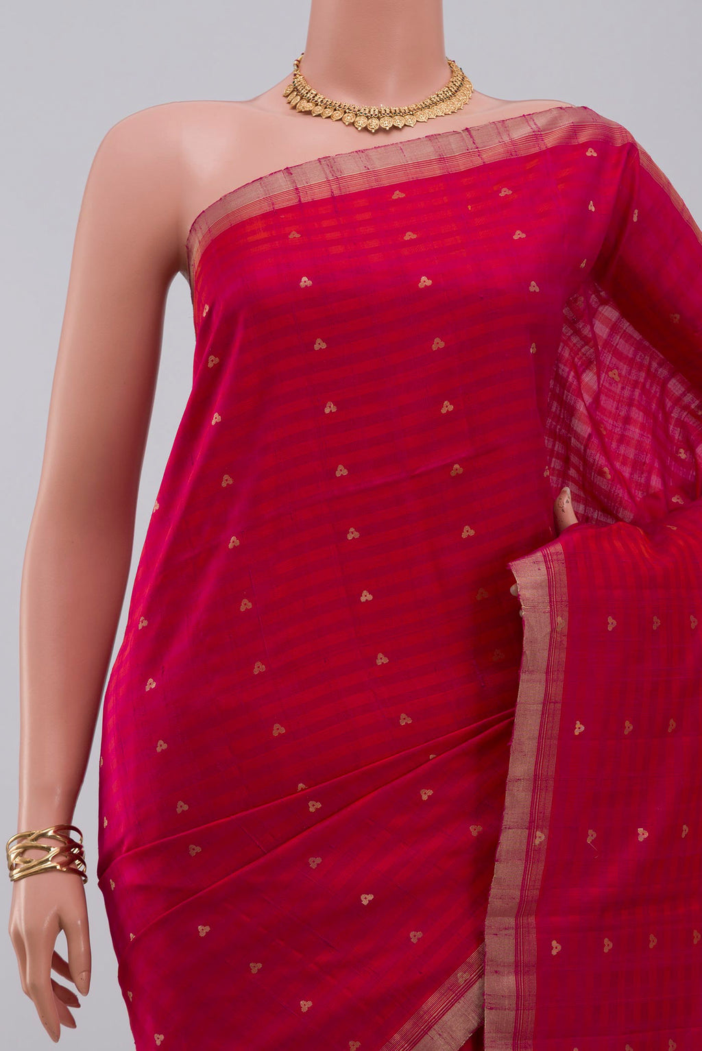 Border image of Pink Soft Silk Saree with Zari Butta on the body and Thin Zari Line. 