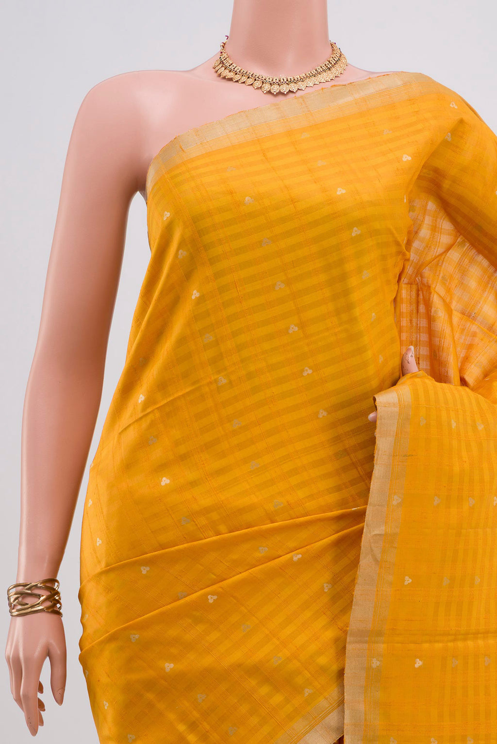 Border image of Yellow Soft Silk Saree with Fancy on the body and Thin Zari Line. 