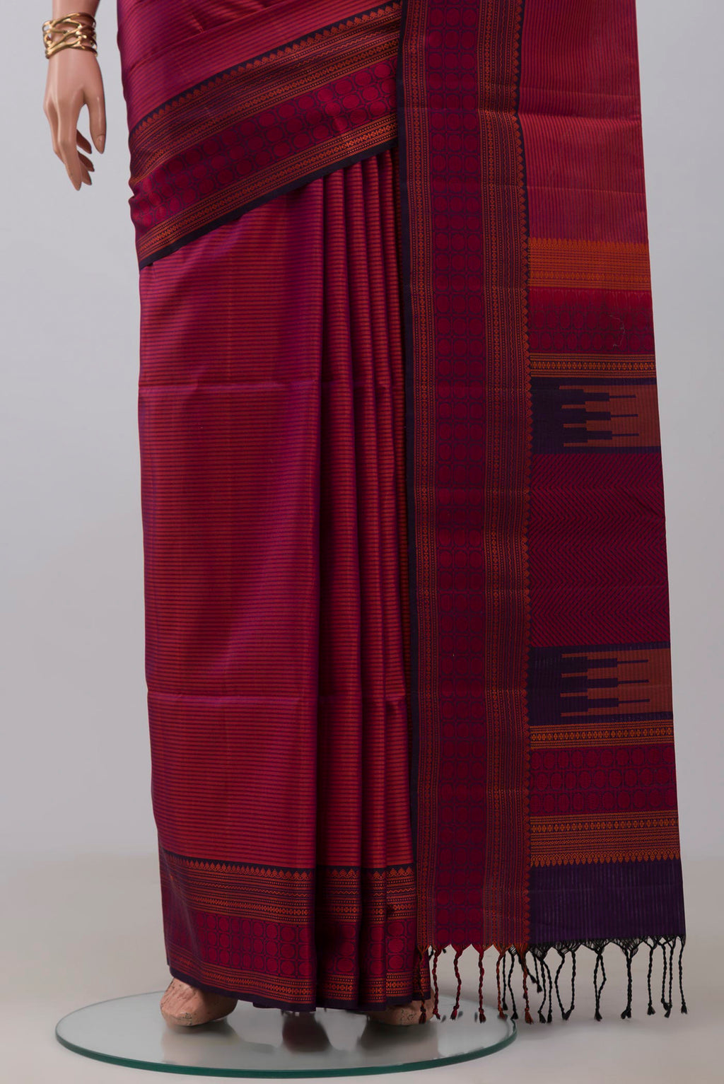 Pleats and pallu of Magenta Dual Tone Soft Silk Saree with Stripes on the body and Thread Border. 
