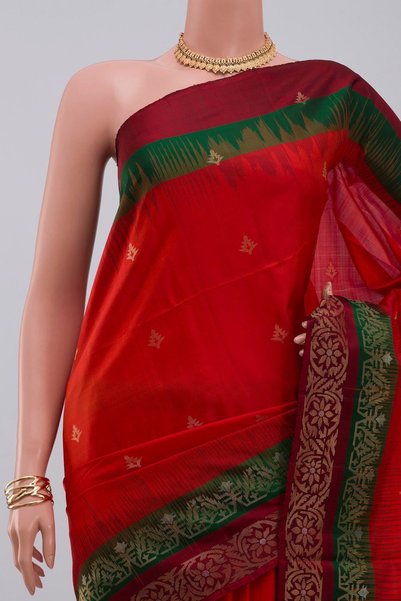 Border image of Red Soft Silk Saree with Zari Butta on the body and Fancy Border. 