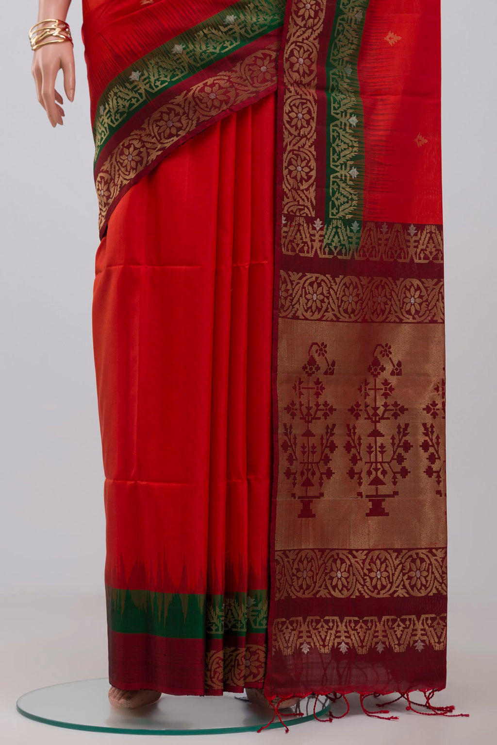 Pleats and pallu of Red Soft Silk Saree with Zari Butta on the body and Fancy Border. 