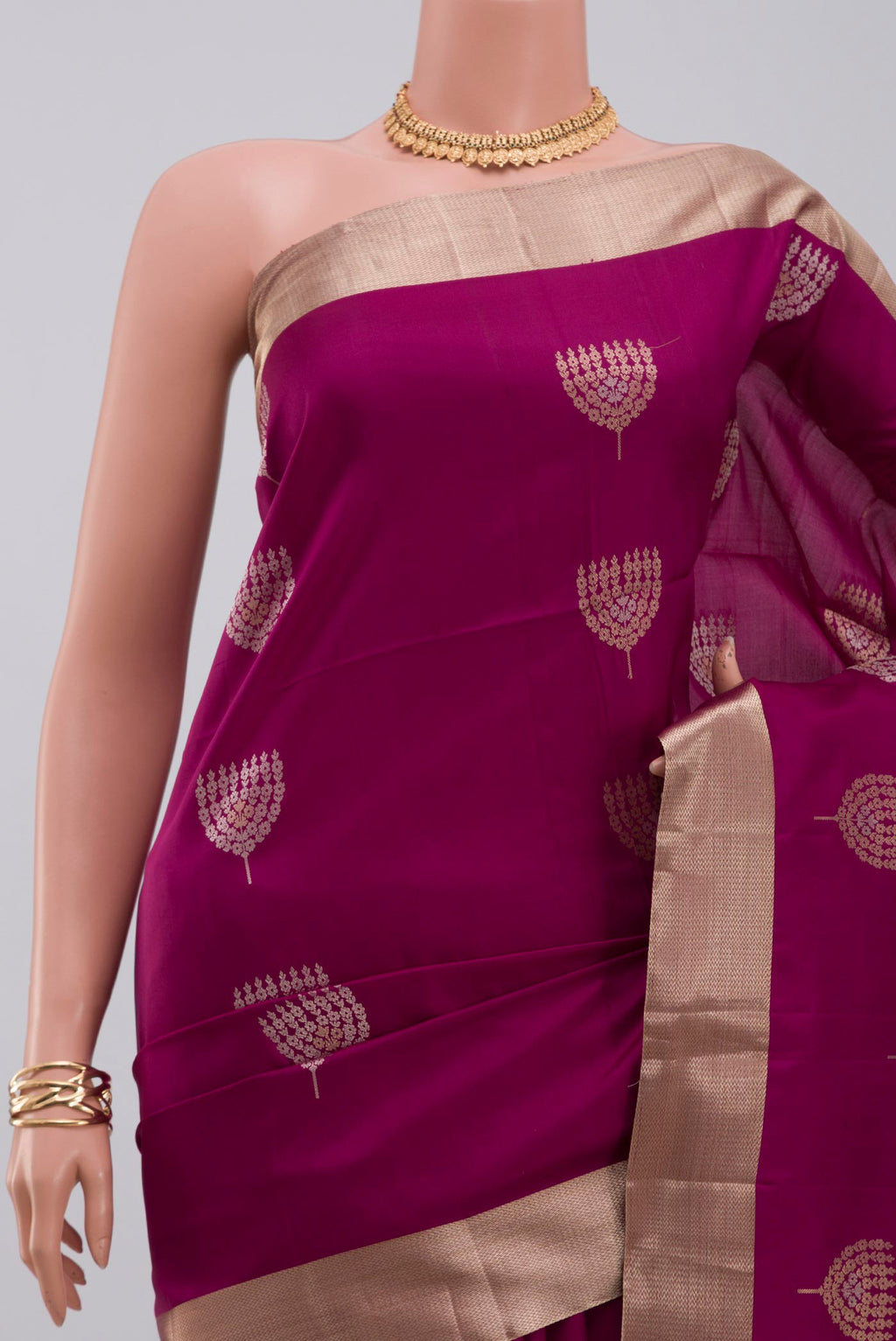 Border image of Purple Soft Silk Saree with Zari Butta on the body and Zari Border. 