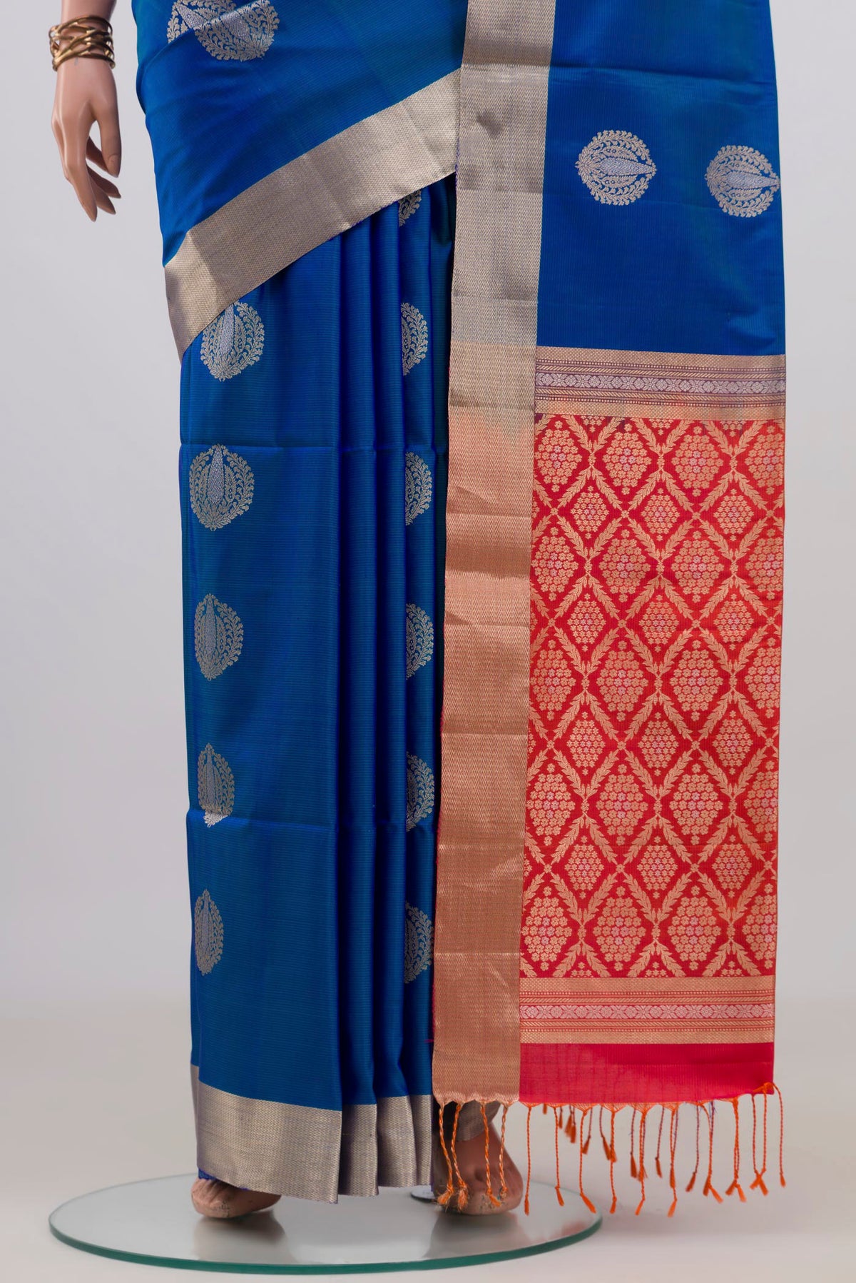 Pleats and pallu of Pure Silk Blue Soft Saree with Zari Butta on the body and Zari Border. 