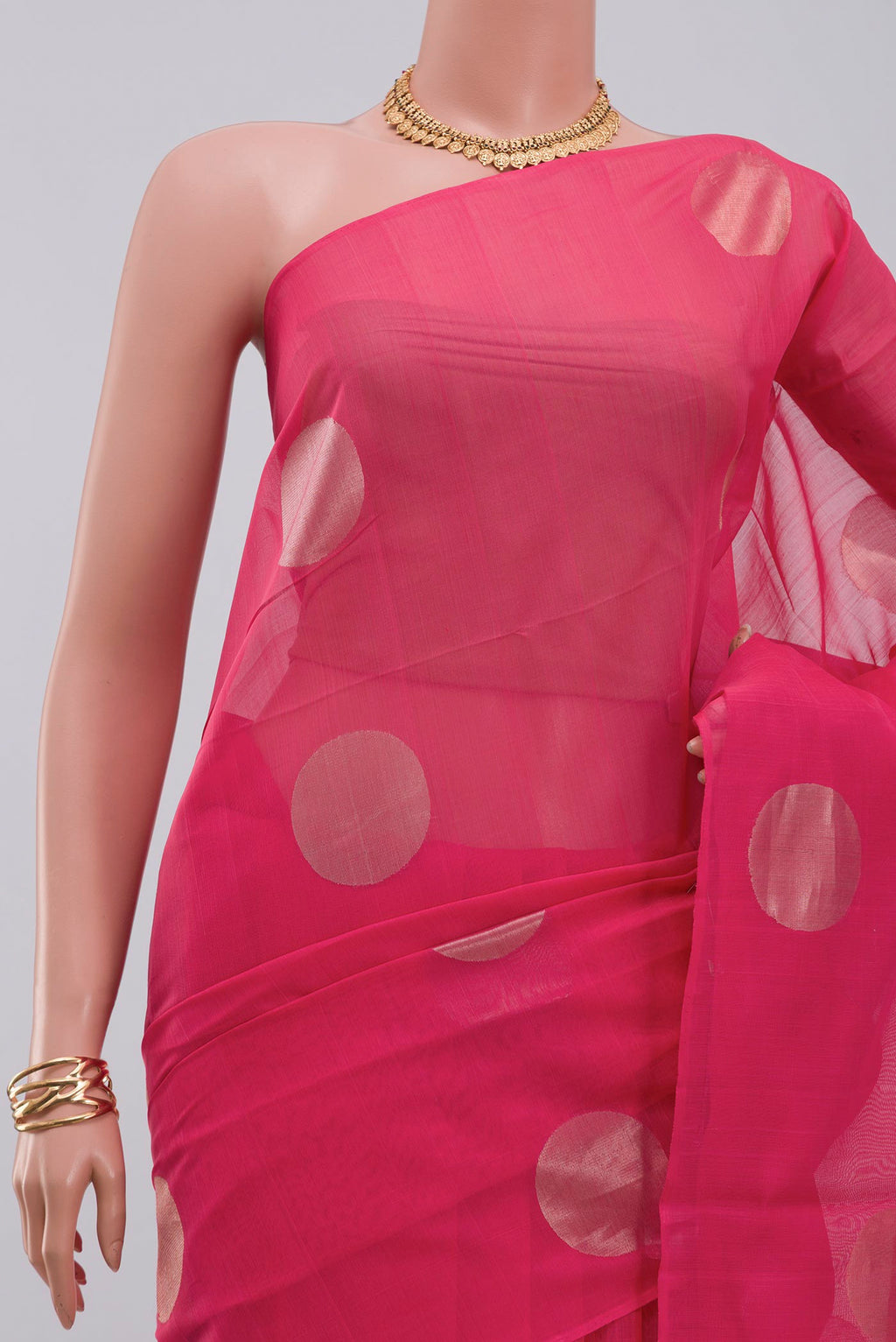 Border image of Pink Silk Cotton Saree with Zari Butta on the body and Without Border. 
