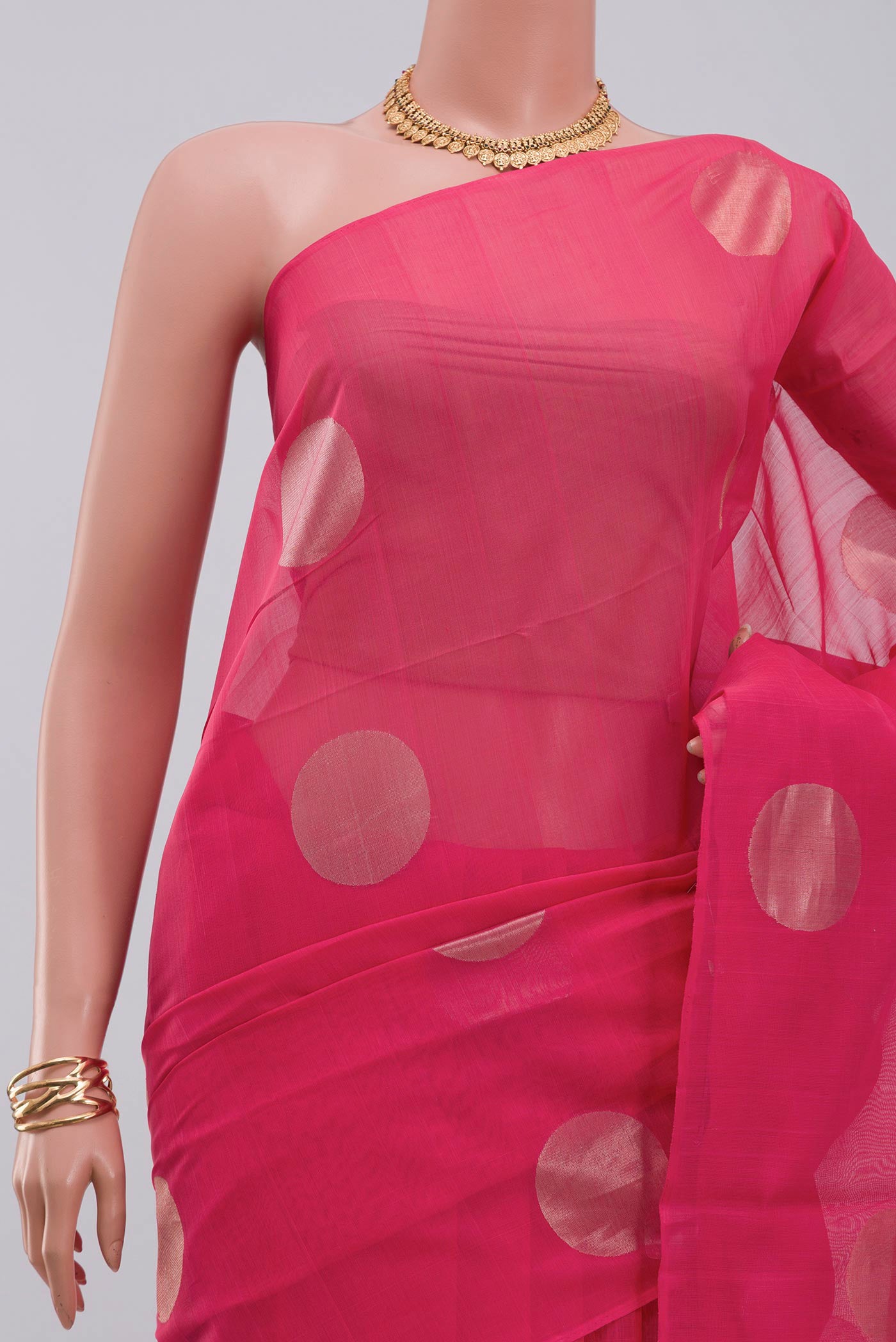 Border image of Pink Silk Cotton Saree with Zari Butta on the body and Without Border. 