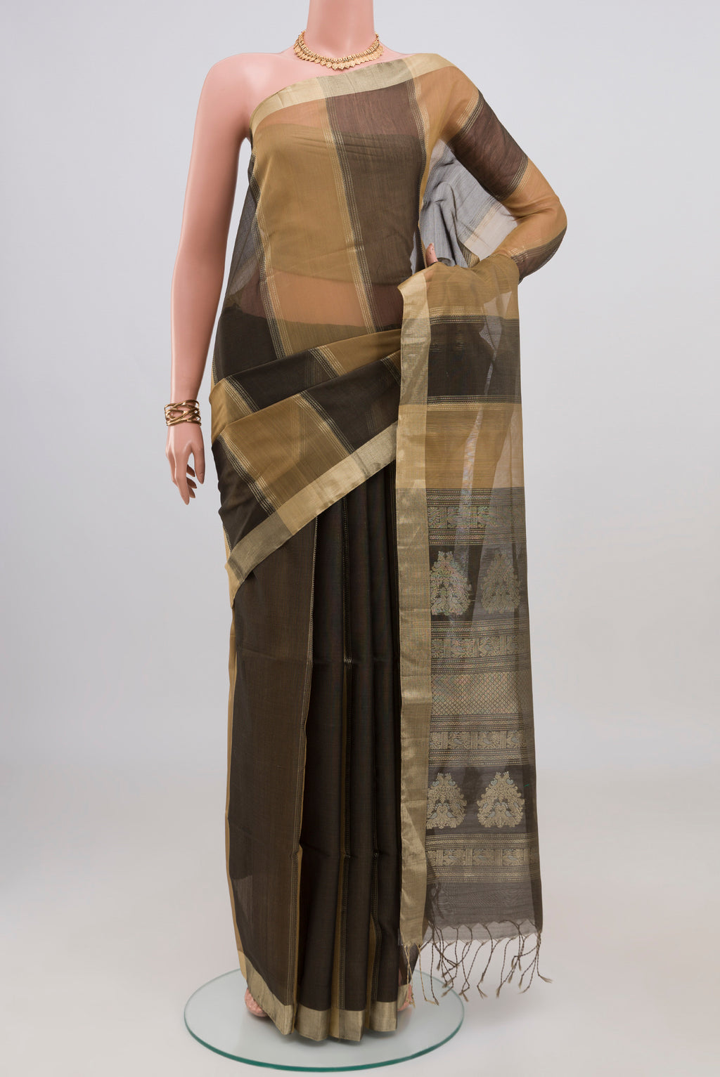 Multi Color Silk Cotton Saree with Stripes on the body and Zari Border.  displayed on a mannequin