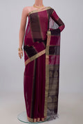 Multi Color Silk Cotton Saree with Fancy on the body and Zari Border.  displayed on a mannequin