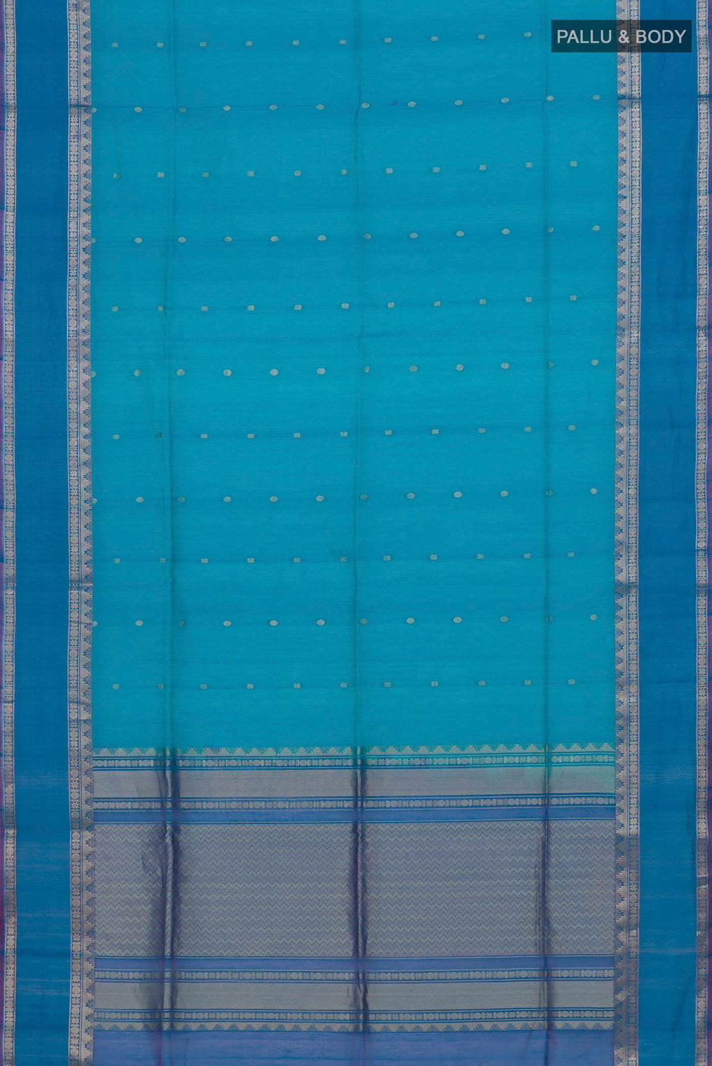Flat view of Blue Silk Cotton Saree with Zari Butta on the body and Zari Border. 