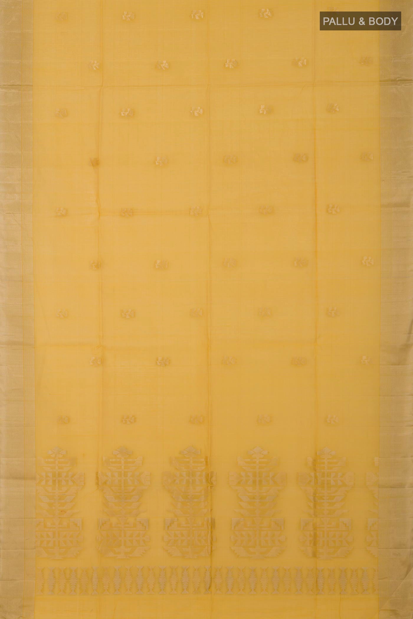Flat view of Yellow Silk Cotton Saree with Zari Butta on the body and Zari Border. 