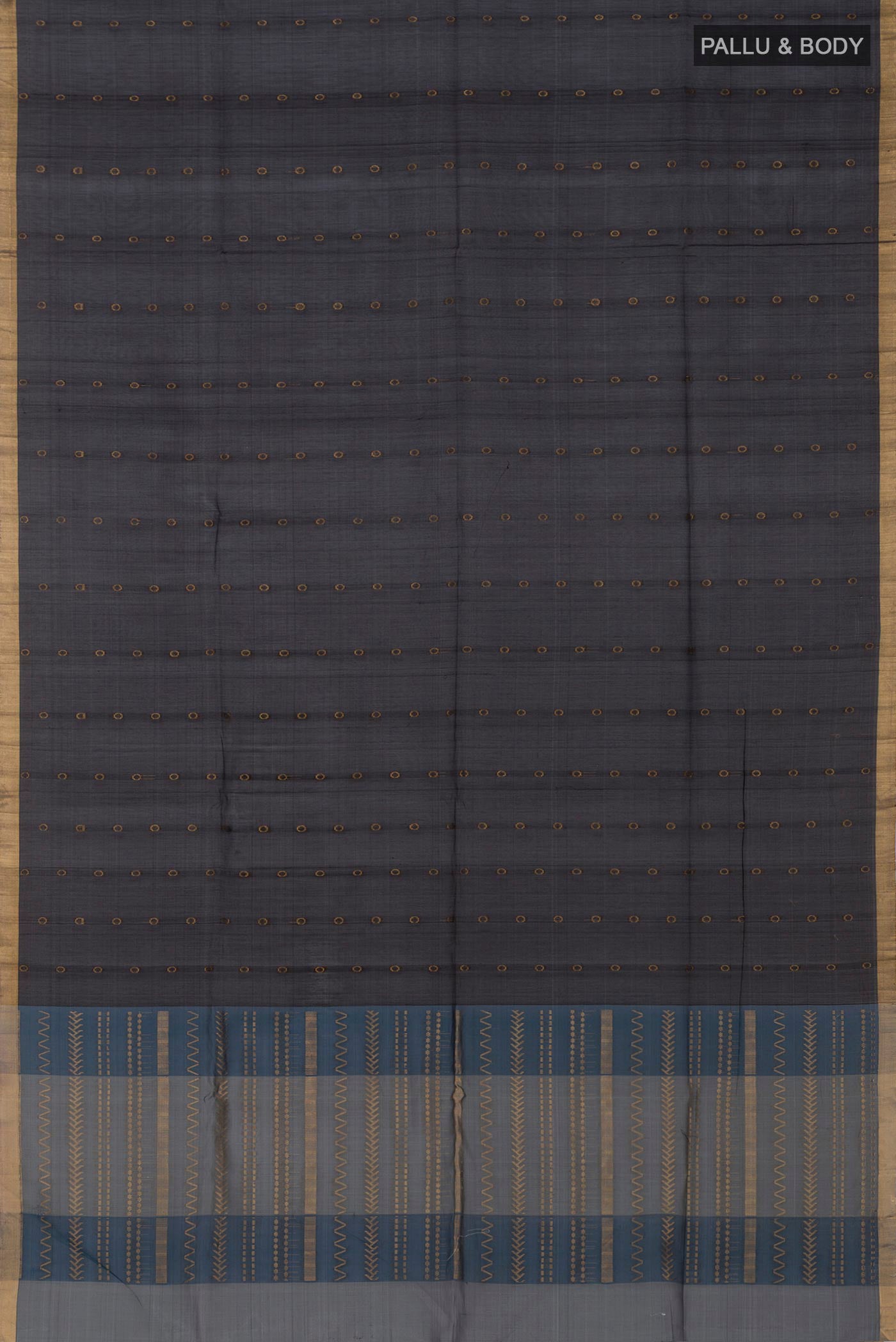 Flat view of Black Silk Cotton Saree with Zari Butta on the body and Thin Zari Line. 