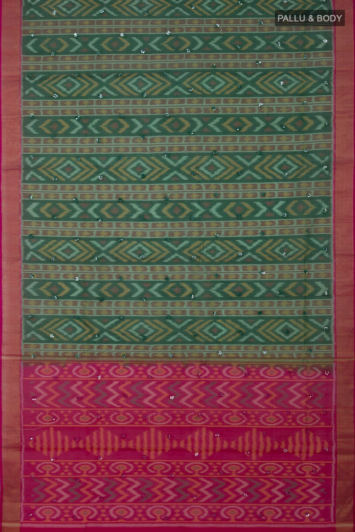 Flat view of Green Silk Cotton Saree with Ikat design on the body and Zari Border. 