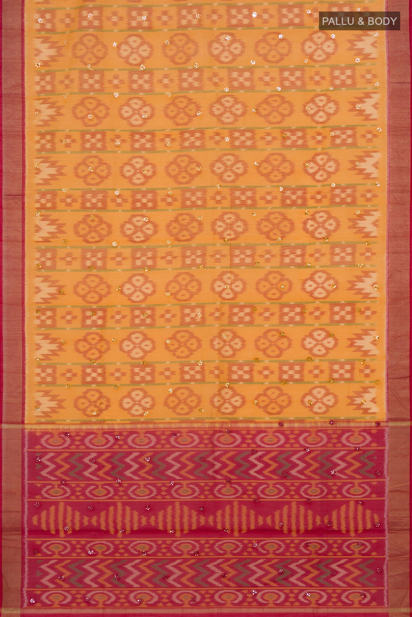 Flat view of Yellow Silk Cotton Saree with Ikat design on the body and Zari Border. 